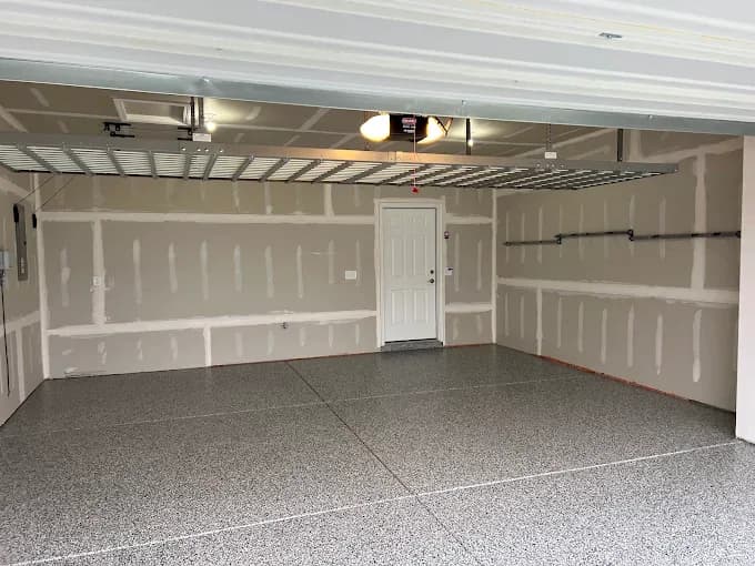 Bright white garage with a freshly coated floor